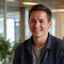 Portrait of Michael Wong, Marketing Director, a creative man with a friendly smile.