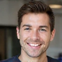 Portrait of Ben Carter, Customer Support Manager, a friendly man smiling.